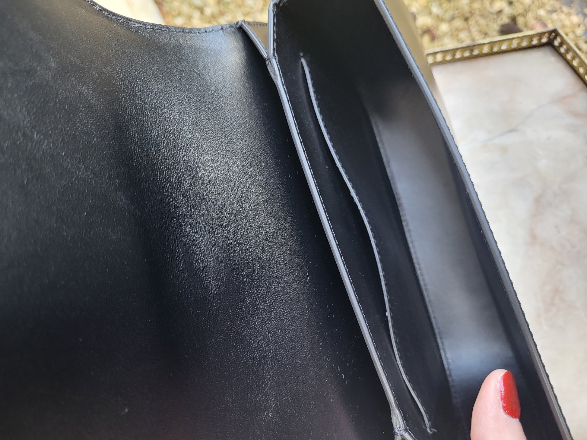 Versace Greca Goddess black leather crossbody bag, brand new with tags. Close up of inside of the bag.