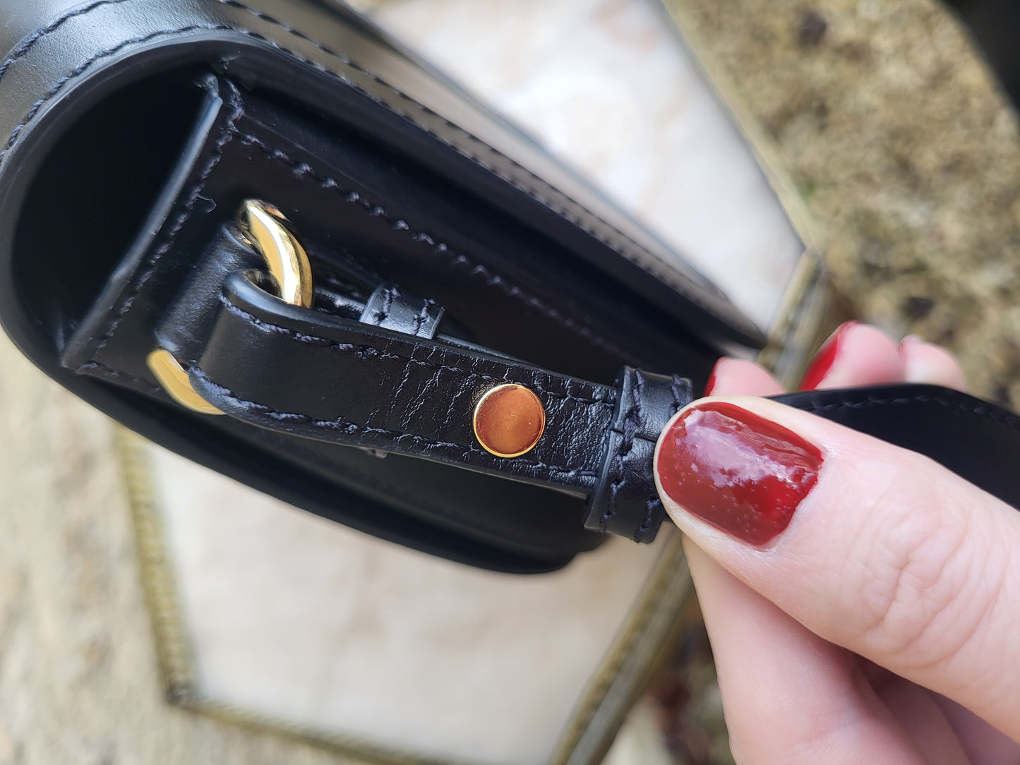 Versace Greca Goddess black leather crossbody bag, brand new with tags. Close up of stitching and hardware.