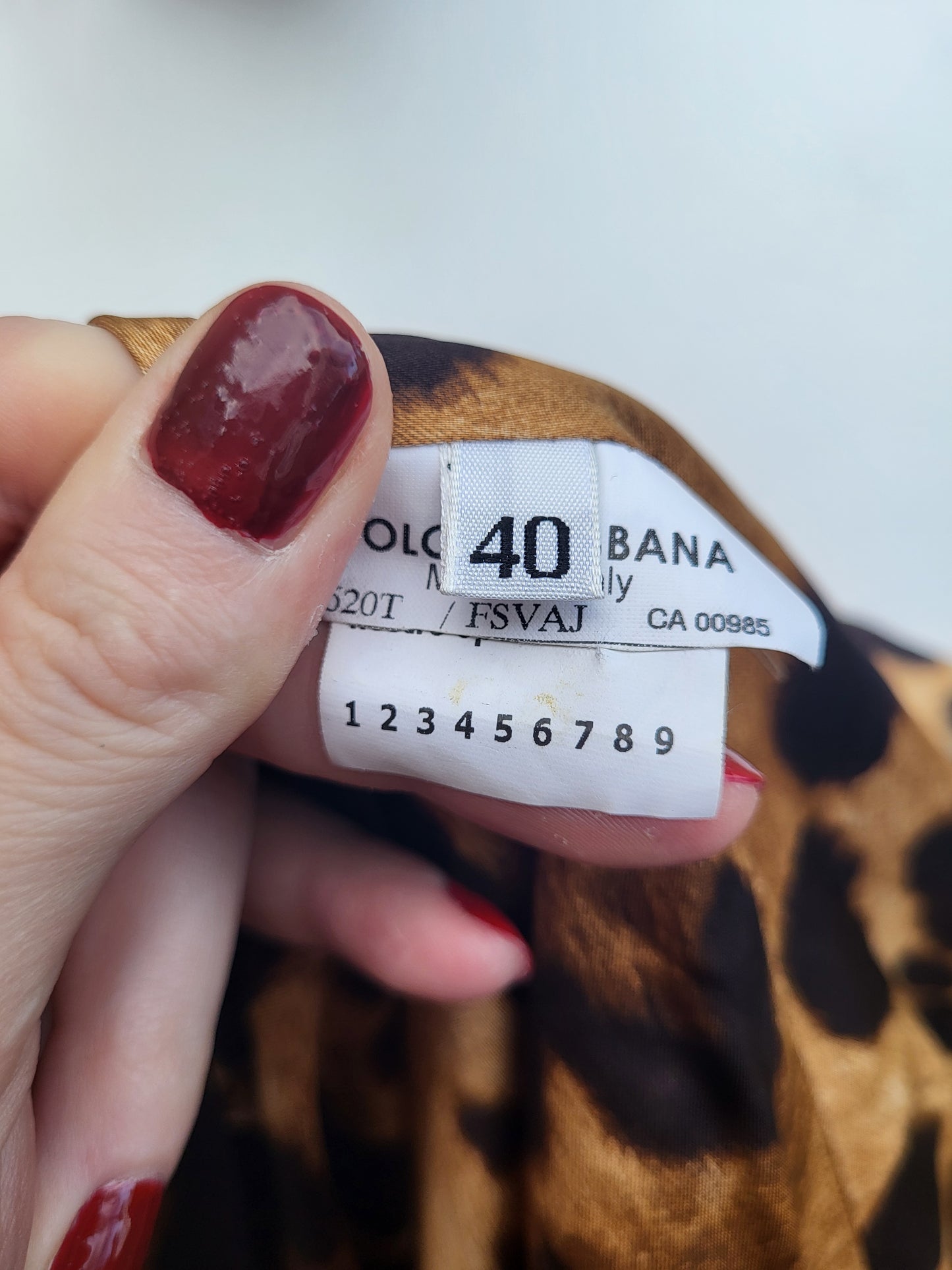 Dolce & Gabbana leopard print velvet blazer, luxury designer jacket, sizing label.